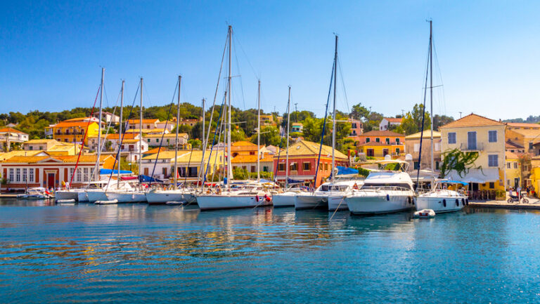 sailboats in the port of gaios on paxos island nearby corfu, greece, europe.